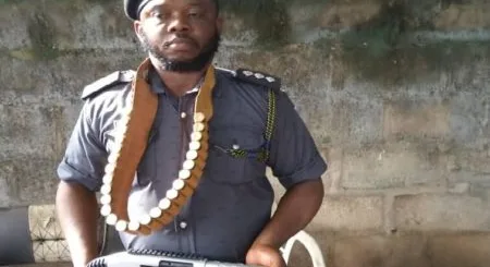 spy police in Nigeria with gun
